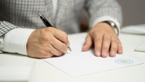 Signing of a document.